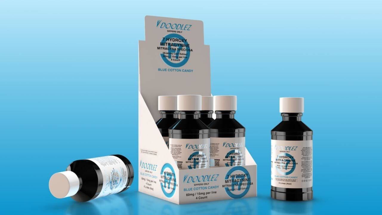 Display box with 4 bottles of Doodlez 7 Hidroxy Mitragynine Mitragyna Speciosa, kratom leaf extracted, flavor Blue Cotton Candy