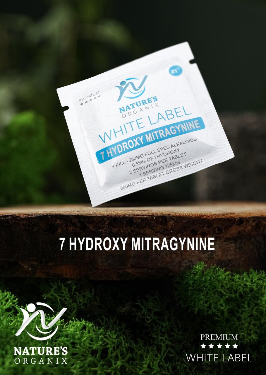 Nature's Organix 7 Hydroxy Mitragynine package on a wooden surface with greenery in the background